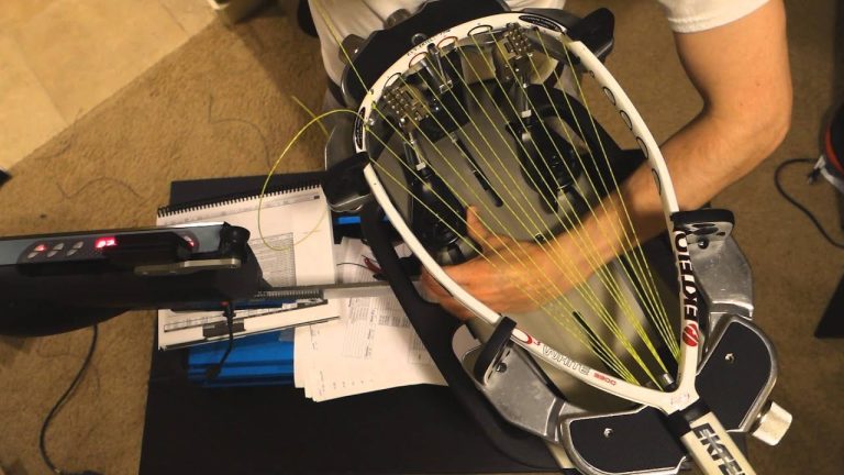 player stringing racquetball racquet